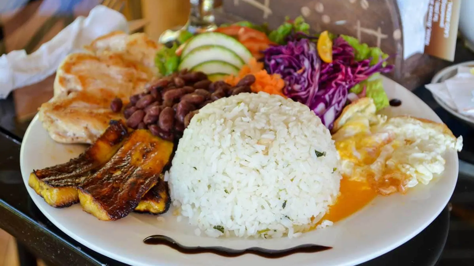Costa Rican casado with grilled fish plated by Eklectic Kitchen